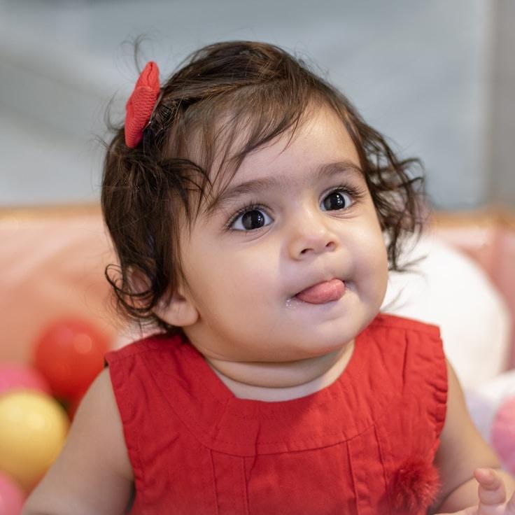 Alex Doe, Lead Design Curator at WillowFieldStone, reviewing corporate floral arrangements